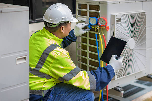Professional Hvac technician working in East Greenwich, RI